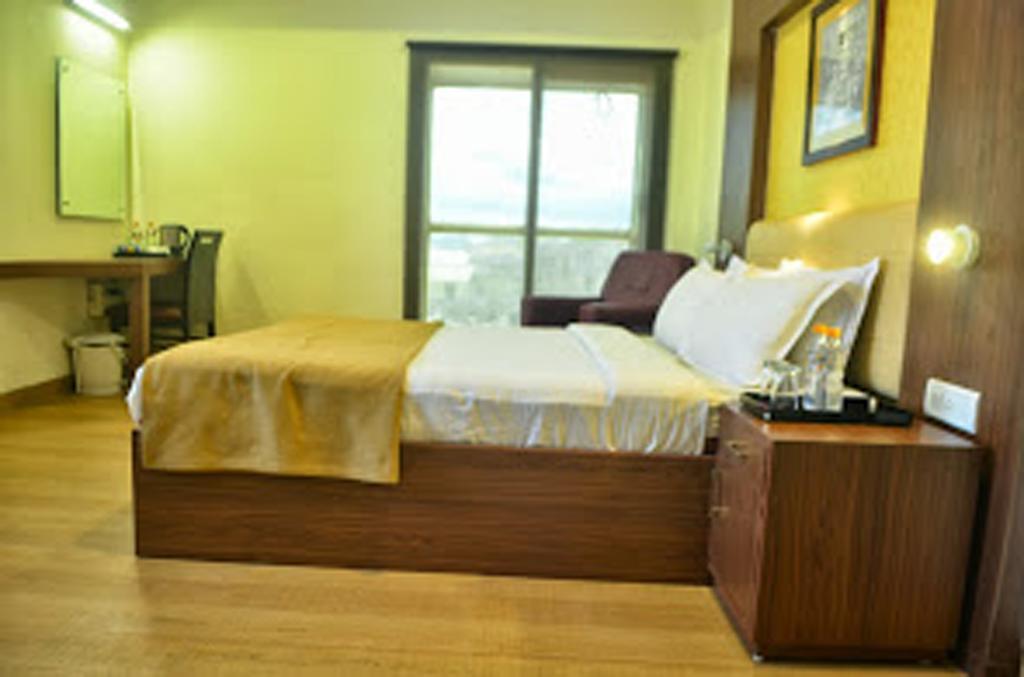 Hotel Arunachala Tiruvannāmalai Rum bild
